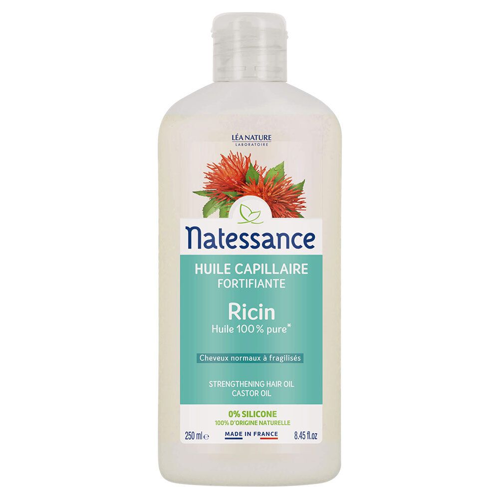 Fles Natessance Huile Capillaire Fortifiante Ricin. 100% pure ricinusolie. Witte dop en etiket met botanische illustratie.