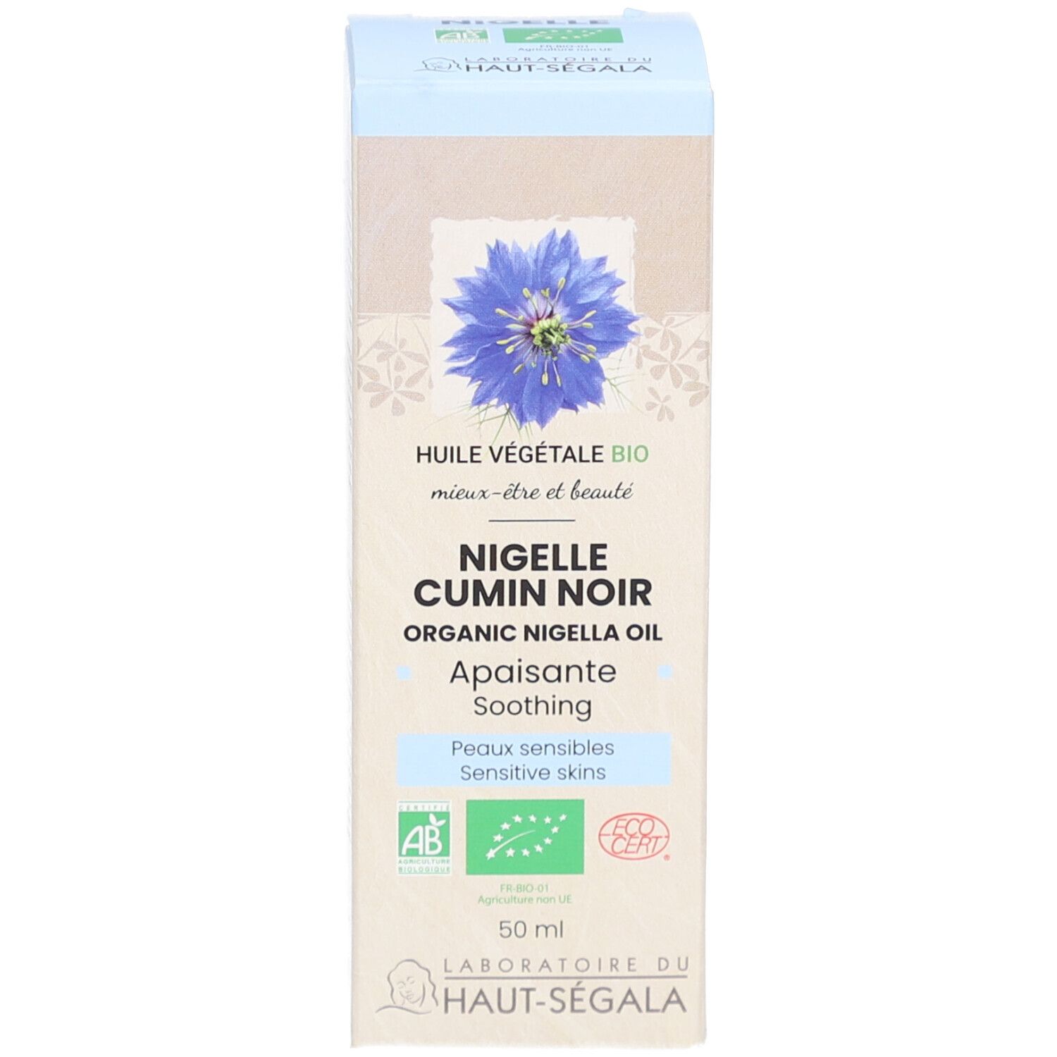Doos. Opschrift: Nigelle Cumin Noir Organic Nigella Oil. Label: Laboratoire du Haut-Ségala. Certificeringen.