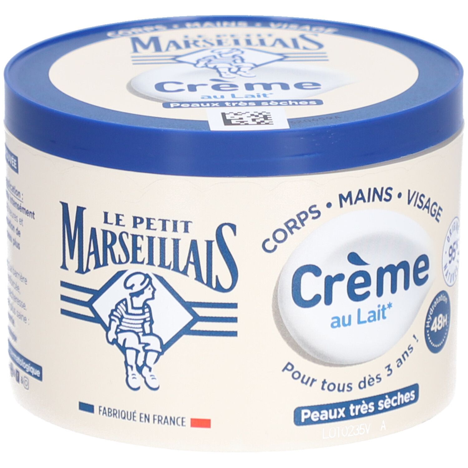 Crèmepot met blauwe deksel. Opschrift: Crème au Lait, Peaux très sèches. Merk: LE PETIT MARSEILLAIS. Hydratatie 48u.