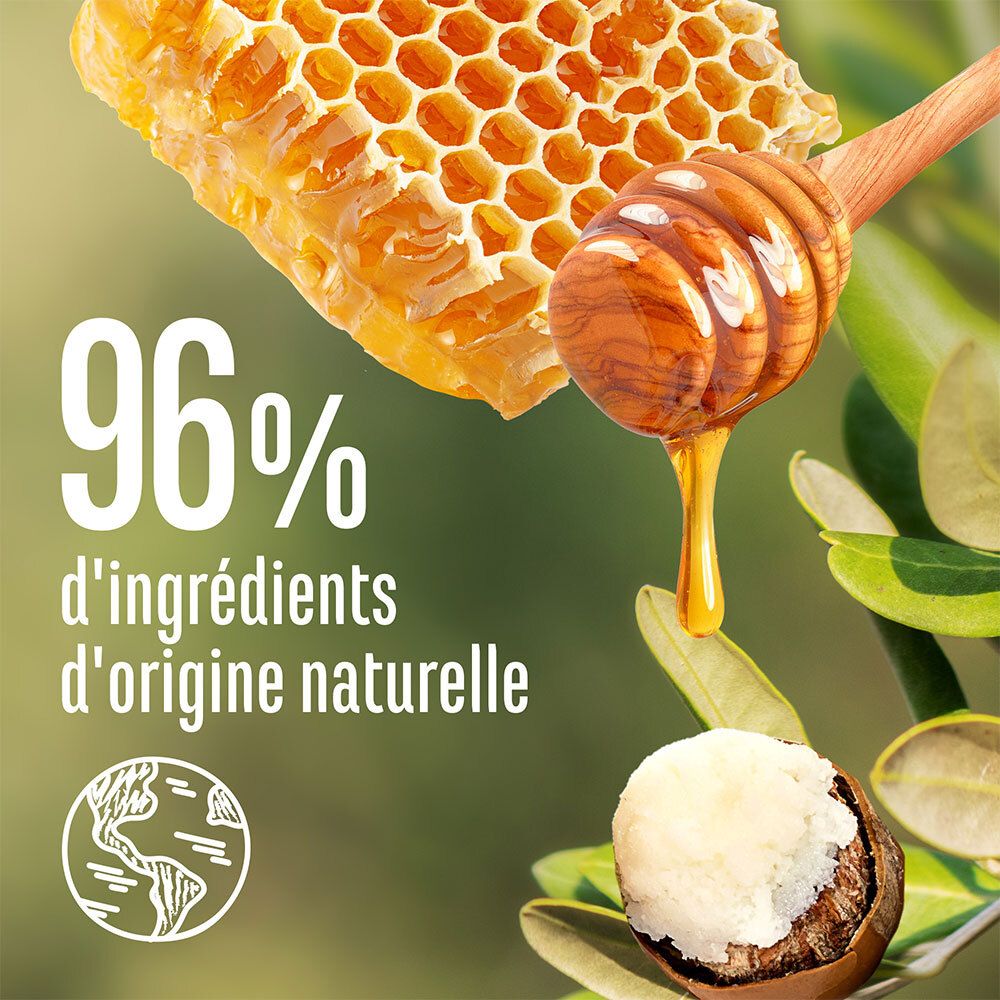 Honingraat, honing en shea butter. Tekst: 96% d'ingrédients d'origine naturelle. Wereldbol symbool.