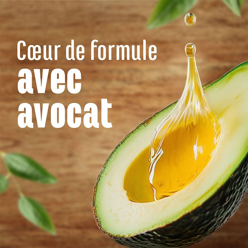 Halve avocado met druppel. Tekst: Cœur de formule avec avocat.
