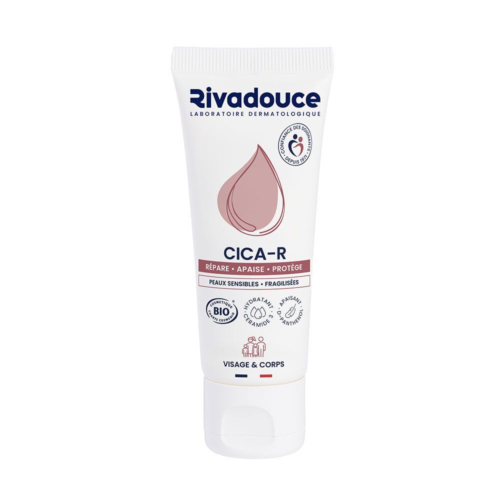 Tube blanc Rivadouche Cica-R. Symbole goutte rose. Répare, Apaise, Protège. Pour peaux sensibles. Visage & corps.