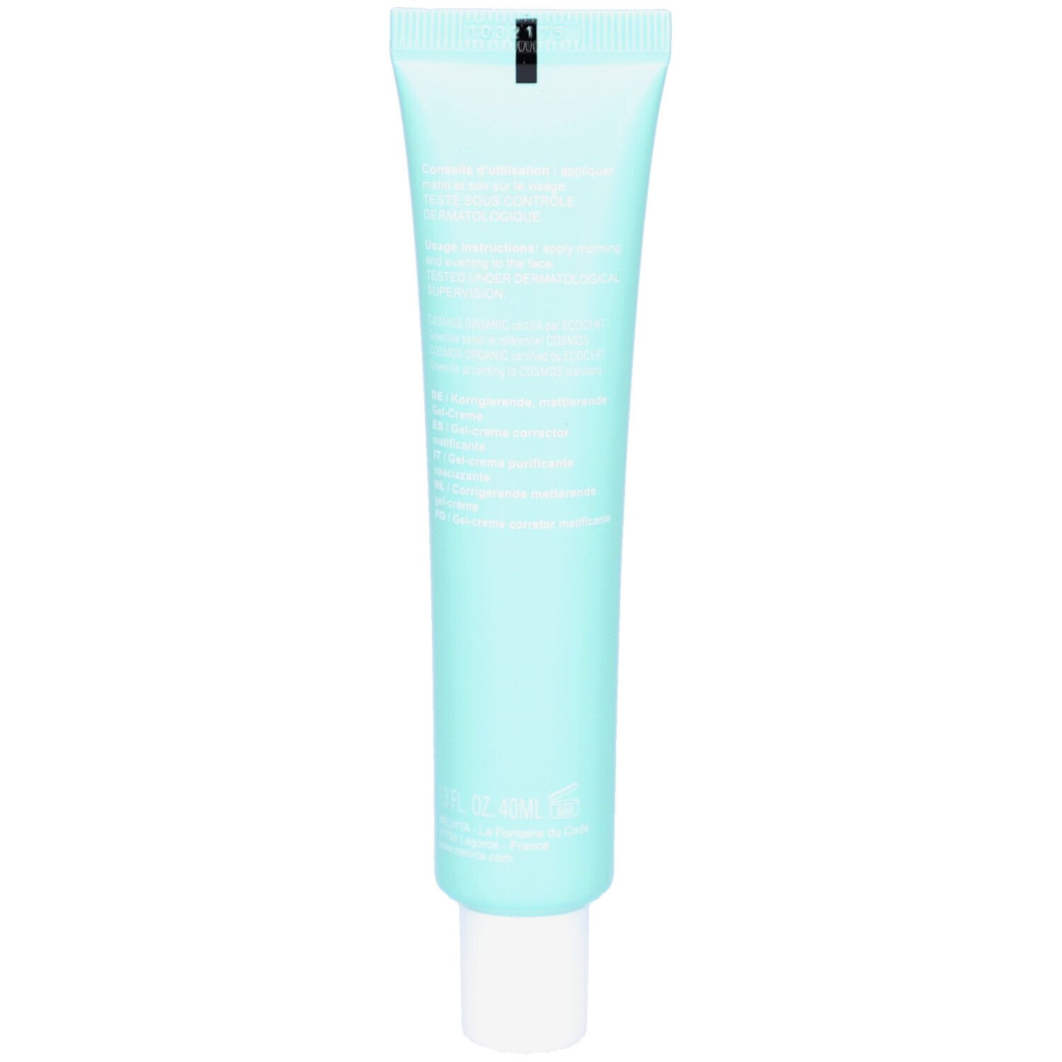 Achterkant van een lichtblauwe tube. Tekst in meerdere talen. Onderaan: 30 ml, gemaakt in Frankrijk.
