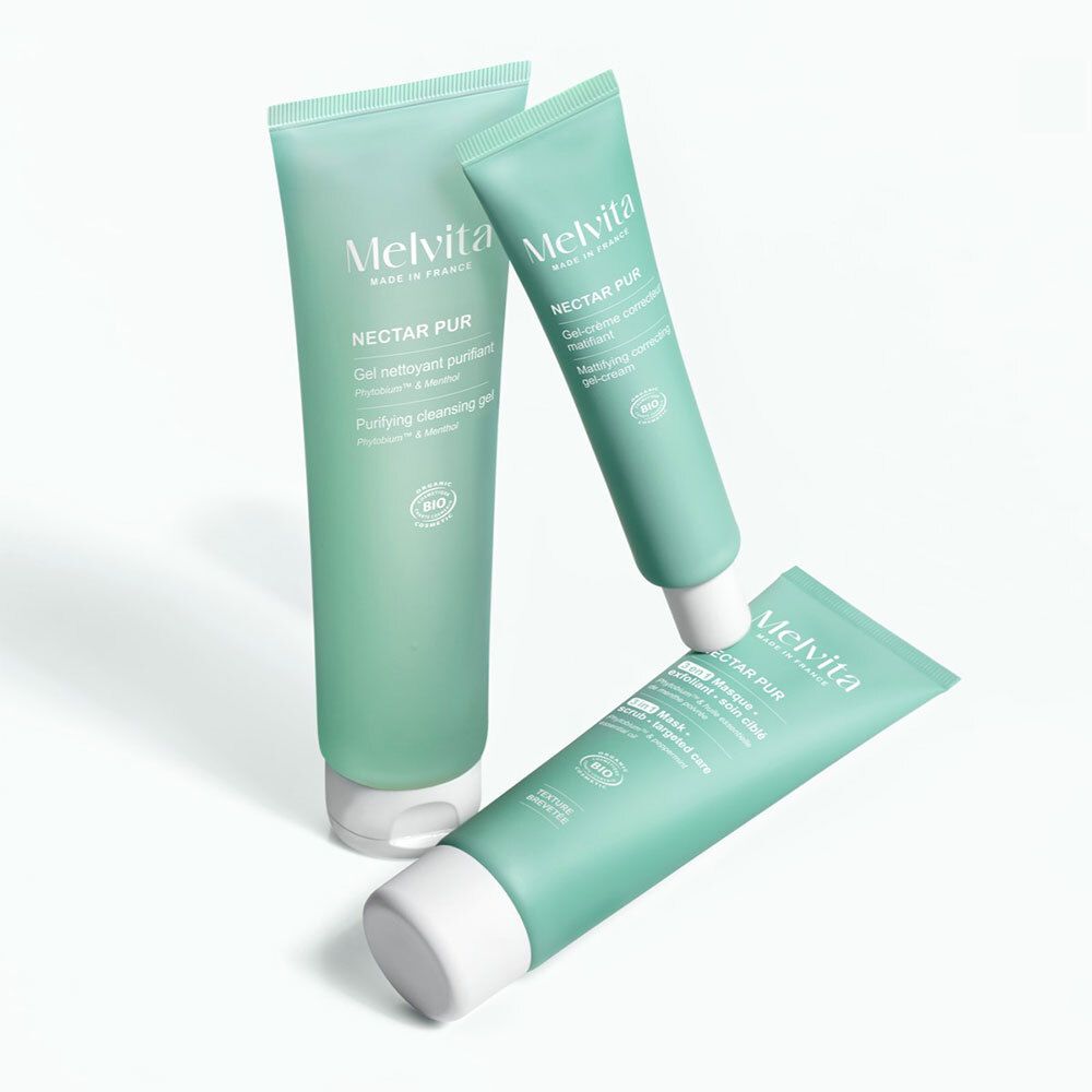 Drie tubes. Opschrift: MELVITA, NECTAR PUR, Gel-crème correcteur matifiant, bio-certificering.
