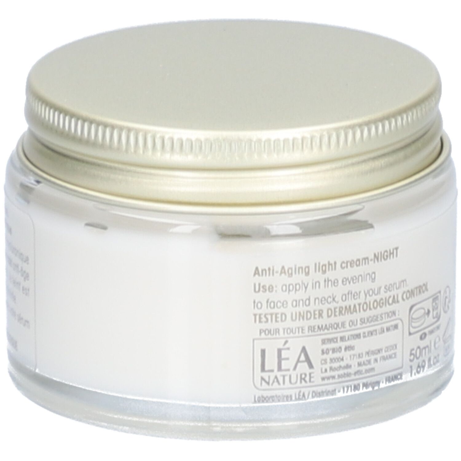 Pot de crème avec couvercle doré. Inscription: Anti-Aging light cream-NIGHT. Testé sous contrôle dermatologique. 50ml.