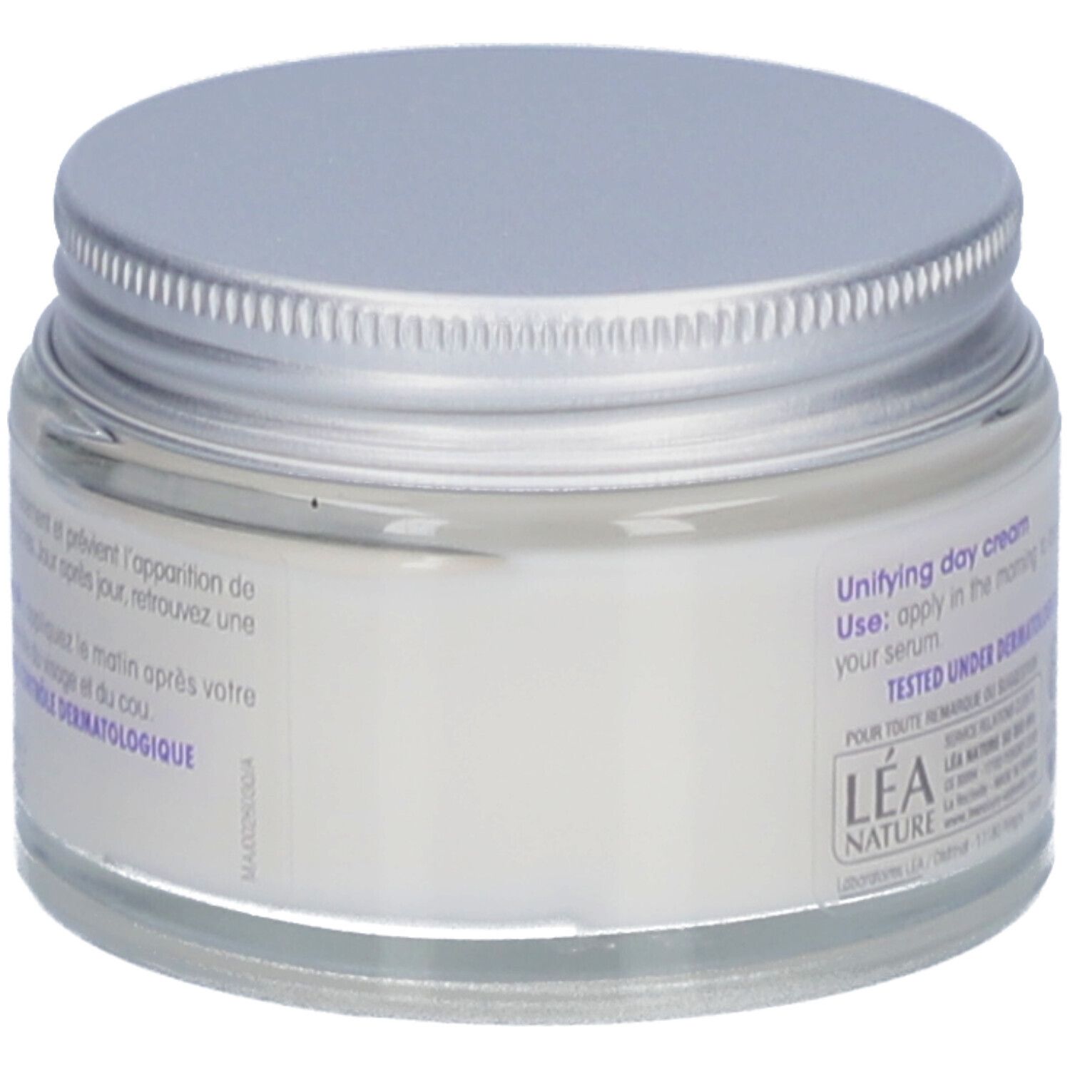 Crèmepot met zilveren deksel. Opschrift: Unifying day cream. Getest onder dermatologische controle. Lea Nature.