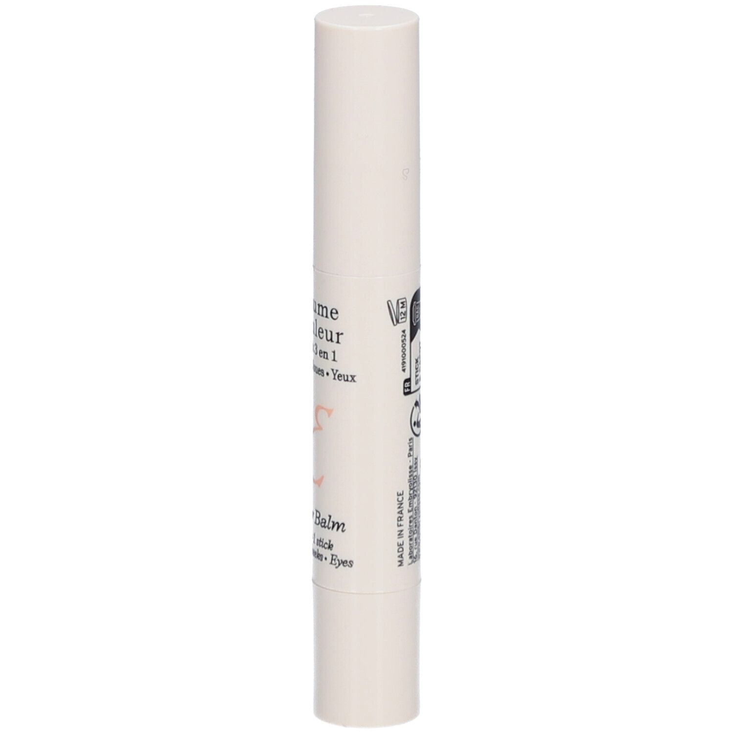 Witte stick met tekst. Opschrift: Baume Couleur Stick 3 en 1. Lippen, Wangen, Ogen. Cilindervorm met afgeronde uiteinden.