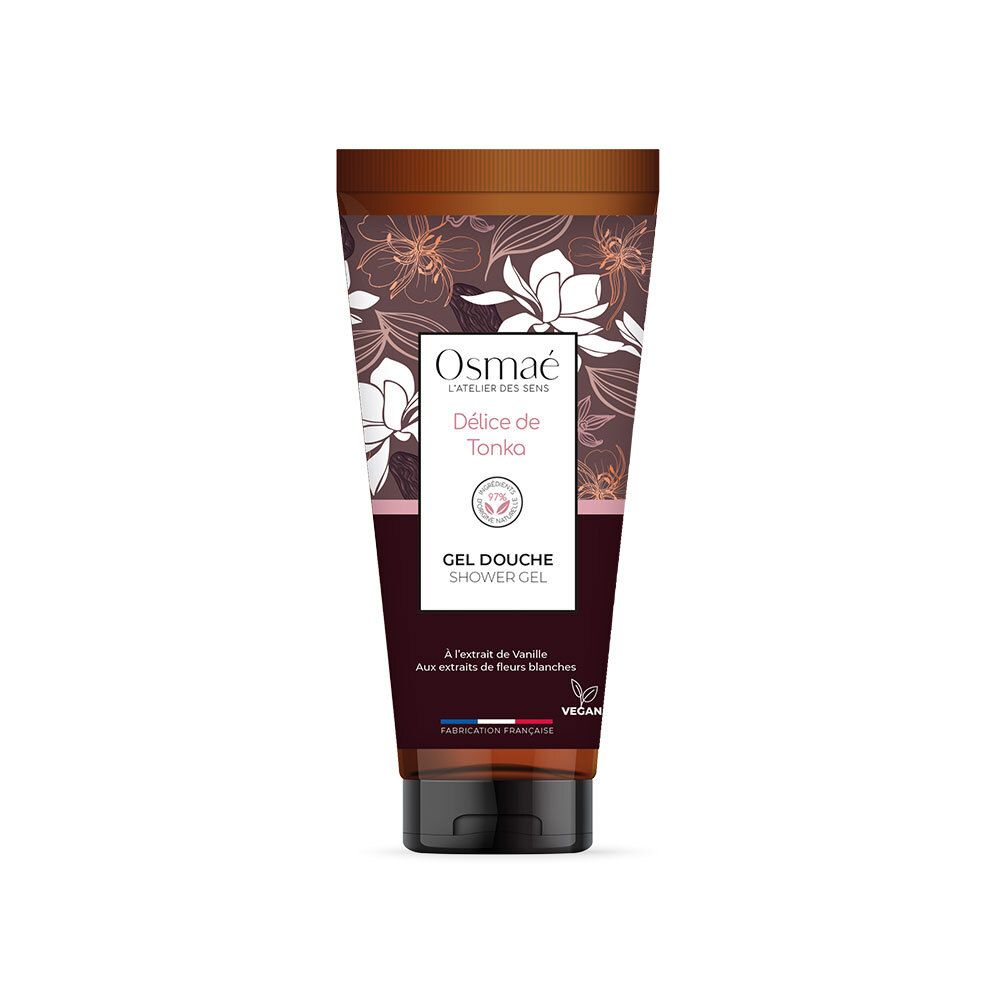 Tube de gel douche marron et blanc, motif floral. Texte: OSMAE, Délice de Tonka, Gel Douche. Label Vegan.