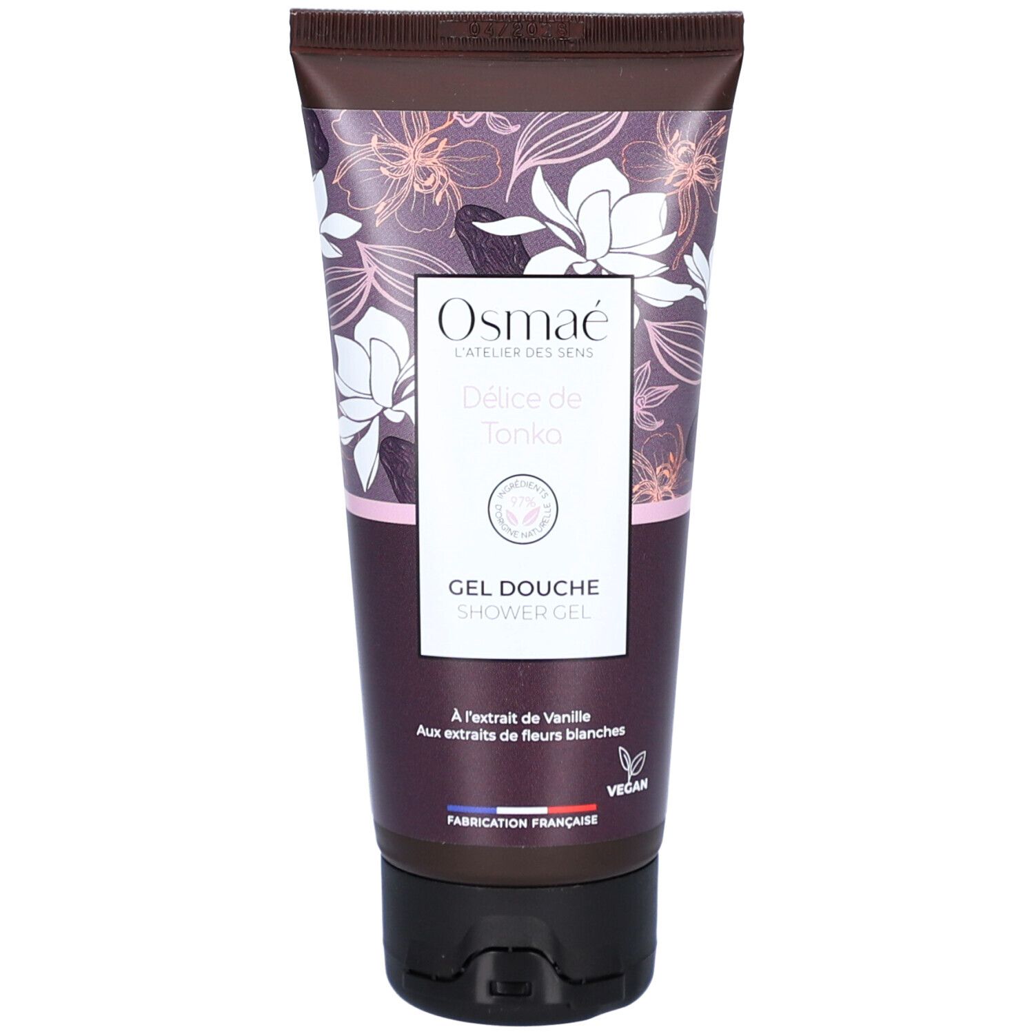 Tube de gel douche avec motif floral. Inscriptions : "OSMAE", "Délice de Tonka", "GEL DOUCHE". Label végan.