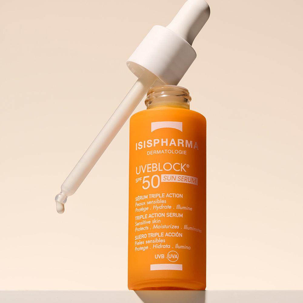 Oranje fles met pipet. ISISPHARMA Uveblock SPF 50+ Sun Serum.