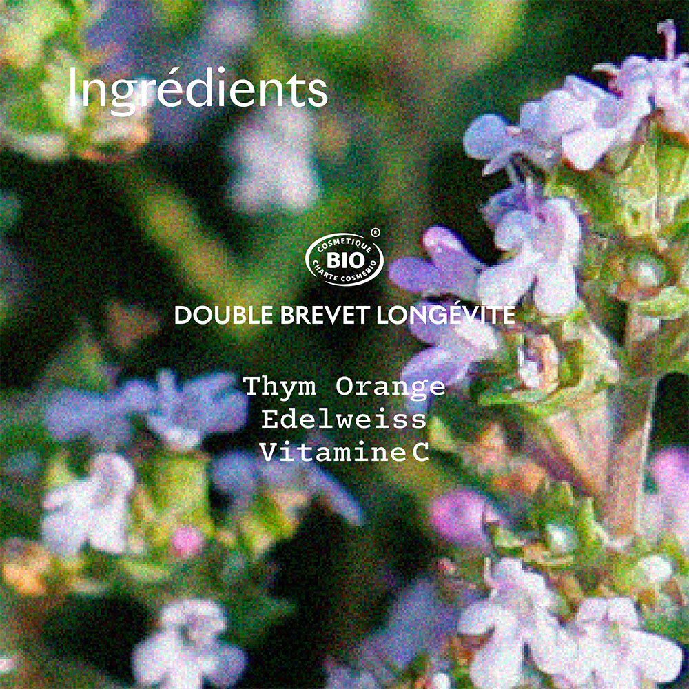 Close-up van tijm bloemen. Tekst: Ingrediënten, Tijm Sinaasappel, Edelweiss, Vitamine C, BIO.