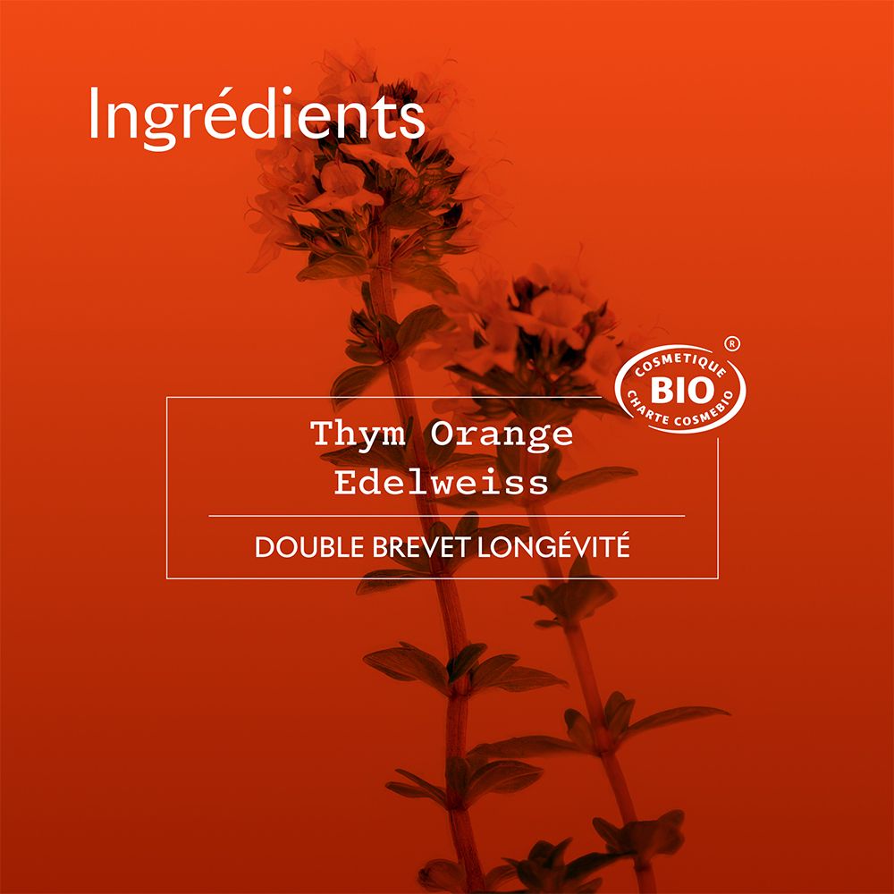 Gros plan sur thym, orange et edelweiss. Texte: DOUBLE BREVET LONGÉVITÉ. Certification Bio.