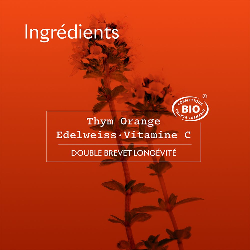 Tekst op oranje achtergrond. Ingrediënten: Tijm, Edelweiss, Vitamine C. Bio-certificering.