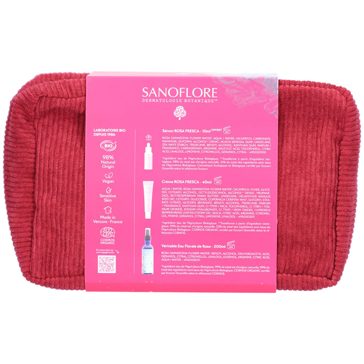Trousse de toilette rouge avec informations produit au dos de l'emballage. Contient noms et ingrédients.