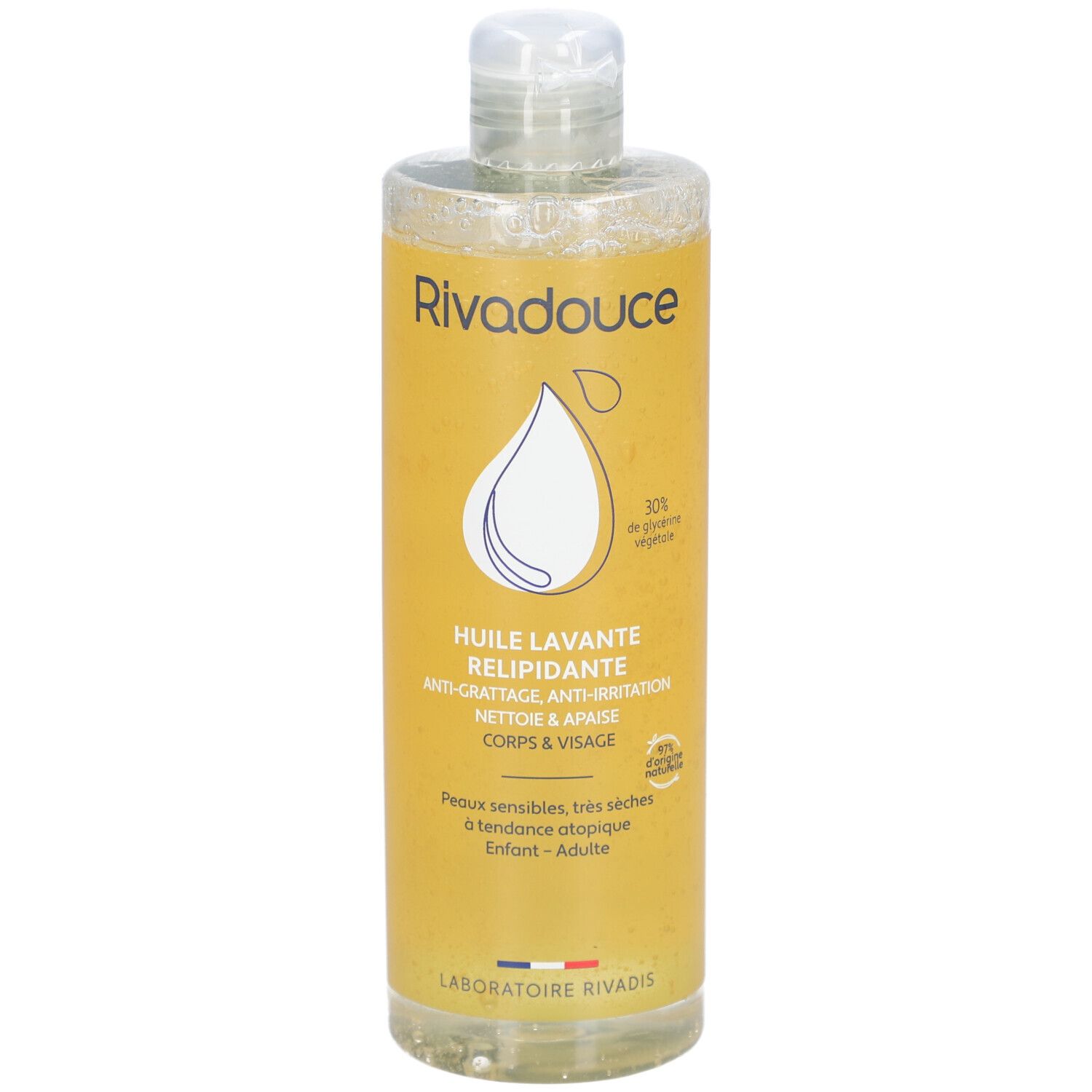 Gele fles met witte dop. Opschrift: Rivadouce, Huile lavante relipidante, Anti-irritatie, Corps & Visage. Voor gevoelige huid.