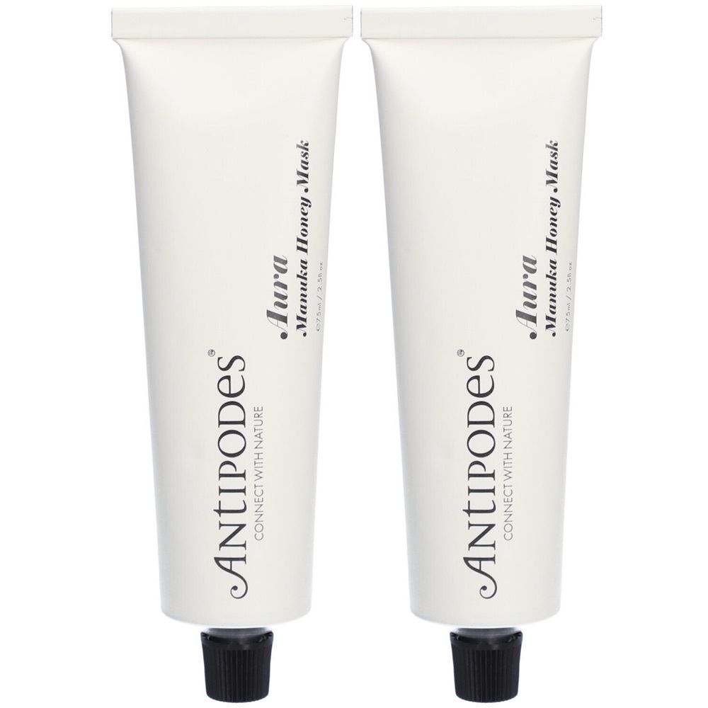 Twee witte tubes met zwarte dop. Op elke tube staat "ANTIPODES" en "Aura Manuka Honey Mask".