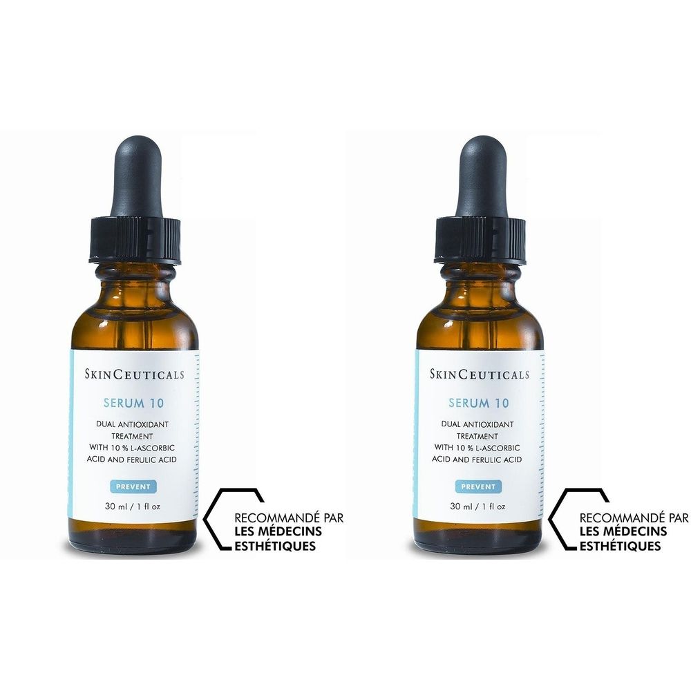 Twee flessen Serum 10 van SkinCeuticals. Bruine glazen flessen met pipet. Opschrift: Dual Antioxidant Treatment.