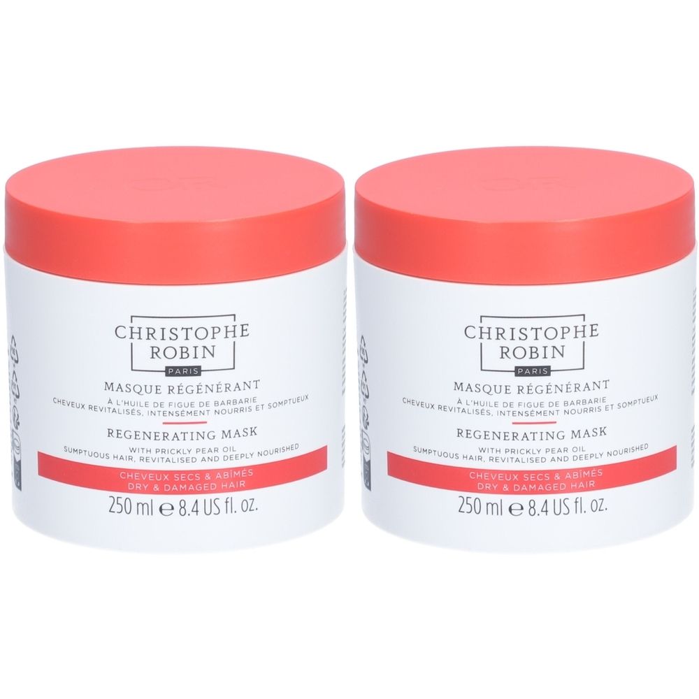 Deux pots ronds avec couvercles rouges. Inscription : CHRISTOPHE ROBIN, MASQUE RÉGÉNÉRANT, REGENERATING MASK. Pour cheveux secs et abîmés.