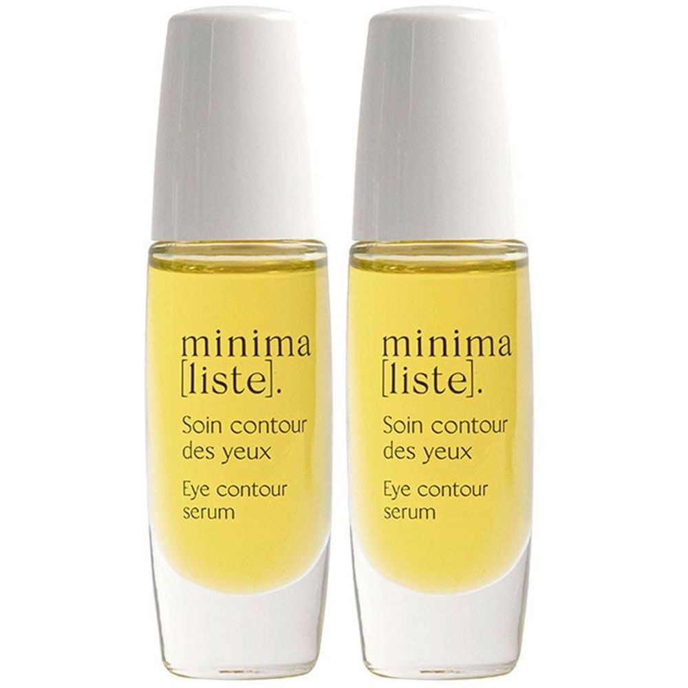 Twee flacons met gele vloeistof en witte doppen. Opschrift: minima [liste]. Soin contour des yeux, Eye contour serum.