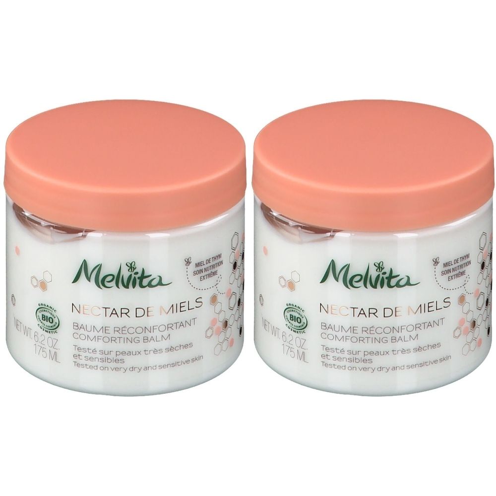 Twee potten Melvita Nectar de Miels Baume Corps. Witte potten met roze deksels. Opschrift: Nectar de Miels, Baume Réconfortant, Bio-label.