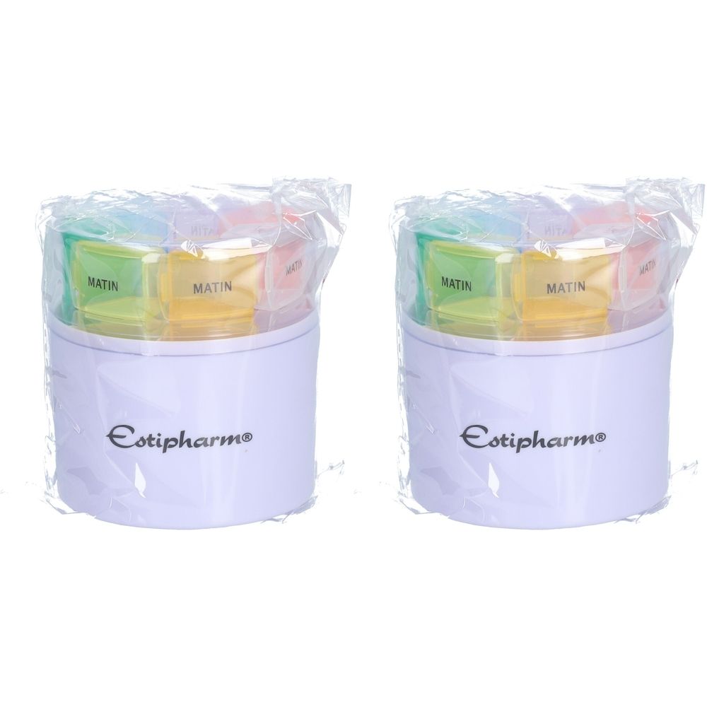 Twee ronde, witte pillendoosjes met gekleurde vakken, verpakt in folie. Opschrift "Estipharm".