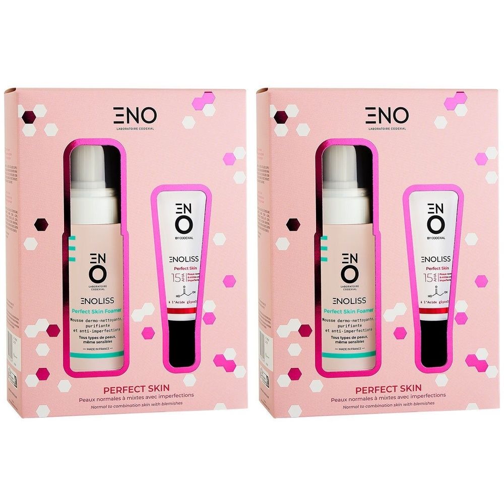 Deux coffrets cadeaux de produits cosmétiques. Chaque boîte contient une bouteille et un tube. Emballage rose à pois blancs.