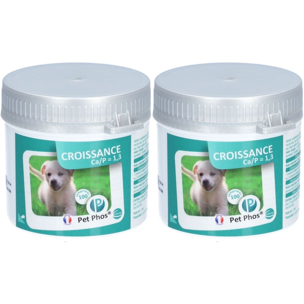 Twee witte potten met zilveren deksels. Labels met "CROISSANCE Ca/P = 1,3" en afbeelding van puppy. Merk: Pet Phos.