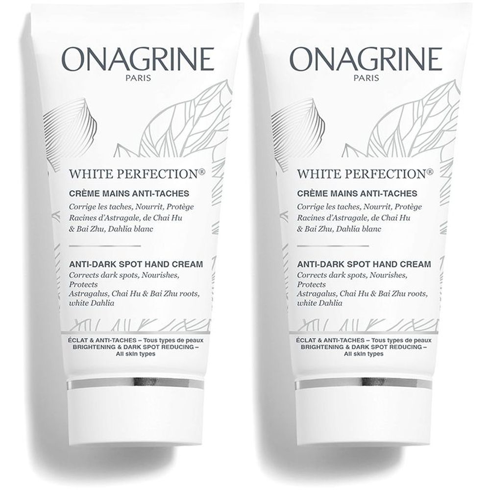 Deux tubes de crème. Inscription: ONAGRINE PARIS, WHITE PERFECTION, CRÈME MAINS ANTI-TACHES, ANTI-DARK SPOT HAND CREAM.