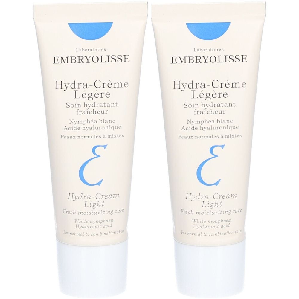Deux tubes de crème. Inscription: Hydra-Crème Légère, Soin hydratant fraicheur. Accents bleus et logo. Pour peaux normales à mixtes.