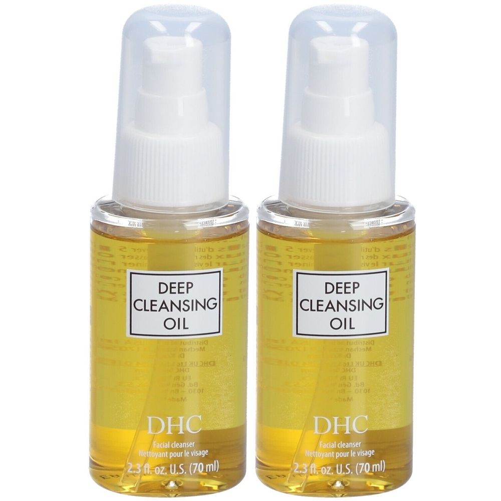 Deux flacons d'huile jaune. Étiquettes "DEEP CLEANSING OIL" et "DHC". Bouchons pompes transparents.