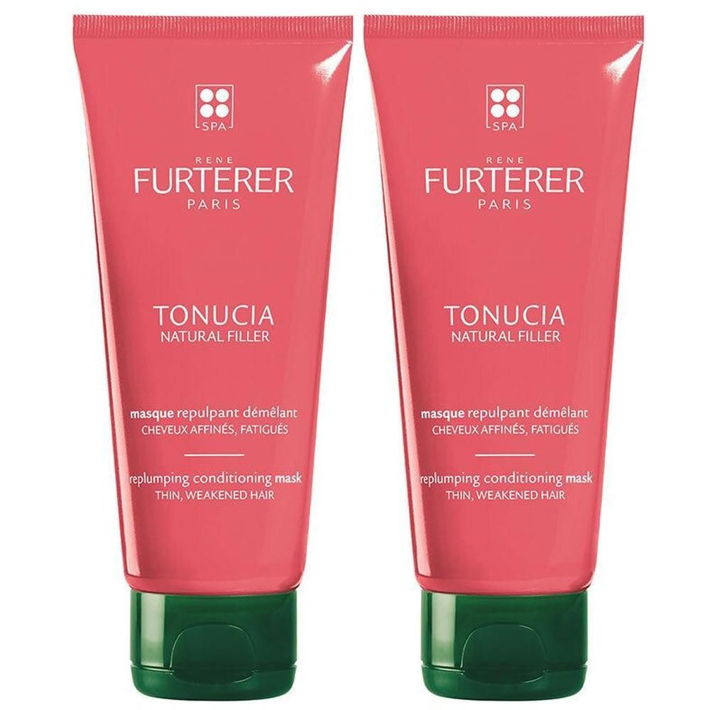 Twee Rene Furterer Tonucia Natural Filler maskers in koraalrode tubes met groene doppen.