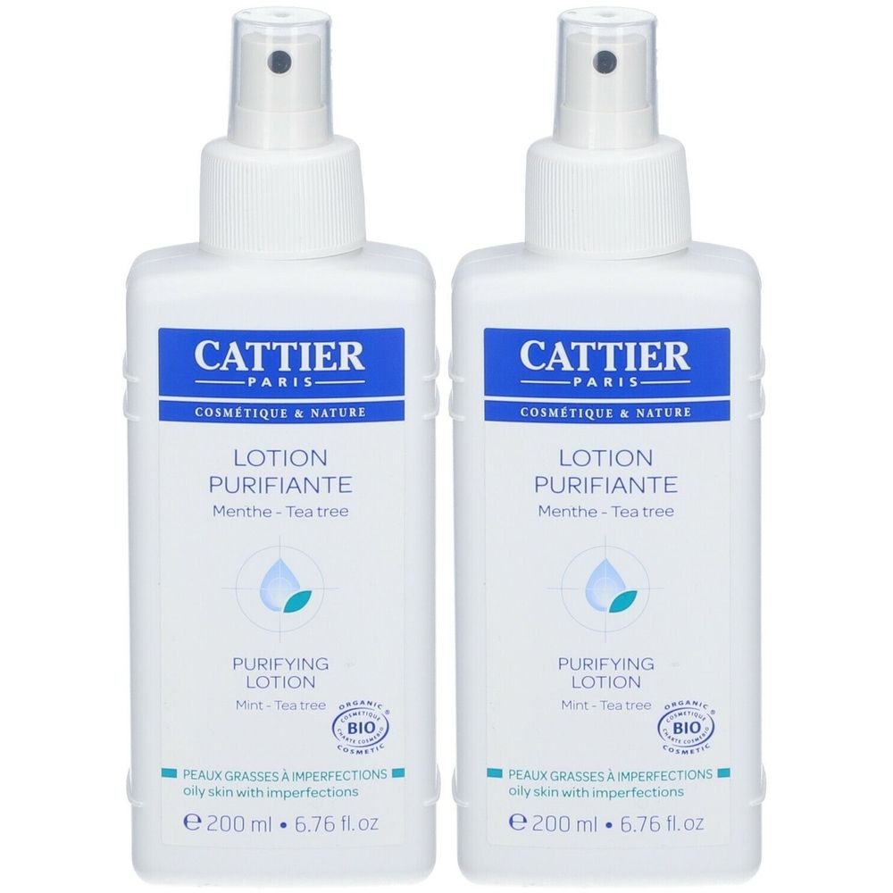 Twee witte flessen met verstuiver. Opschrift: Cattier Paris, Lotion Purifiante. Bio-certificering.