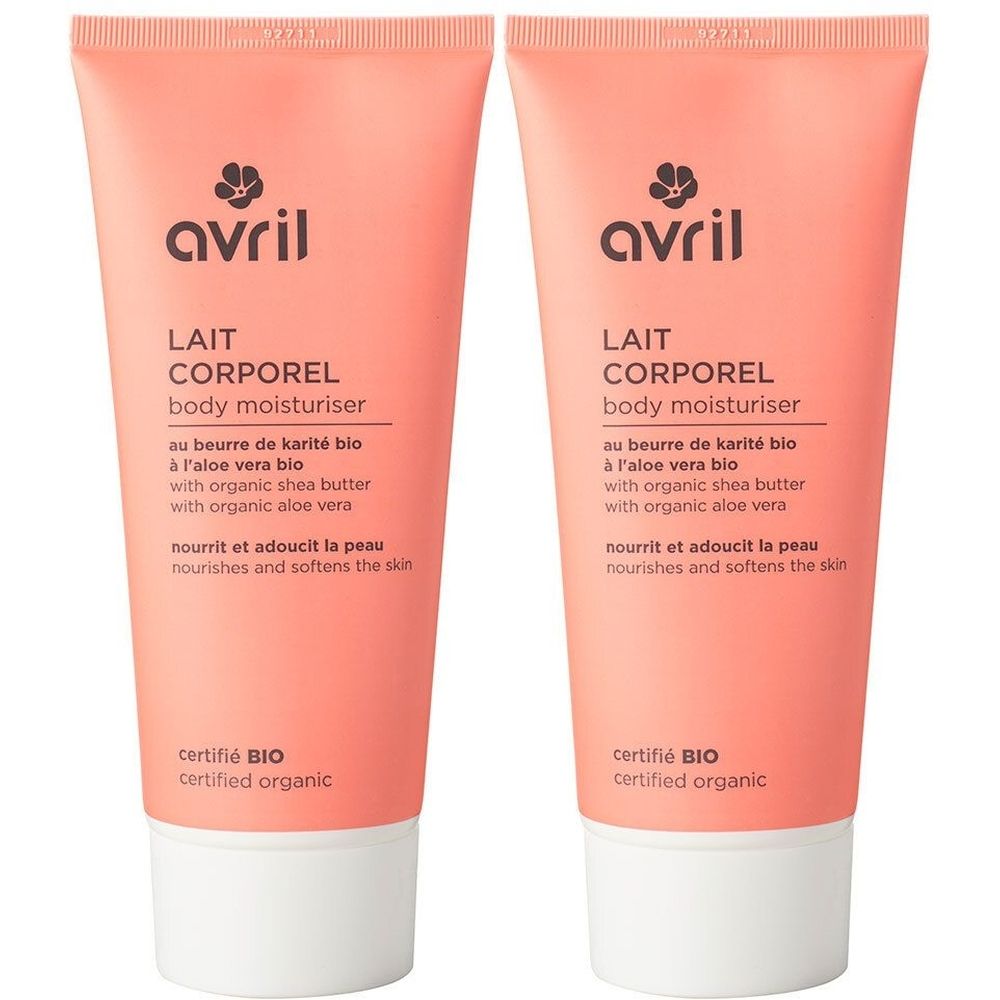 Twee roze tubes bodylotion. Opschrift: Avril, Lait Corporel, gecertificeerd BIO. Witte dop. Tekst in het Frans en Engels.