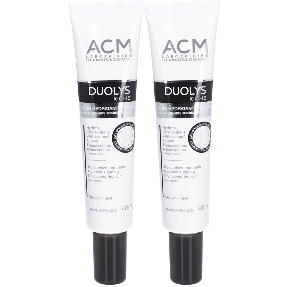 Deux tubes de ACM Duolys Riche. Tubes blancs avec texte noir. Contient des informations sur les ingrédients et l'utilisation.
