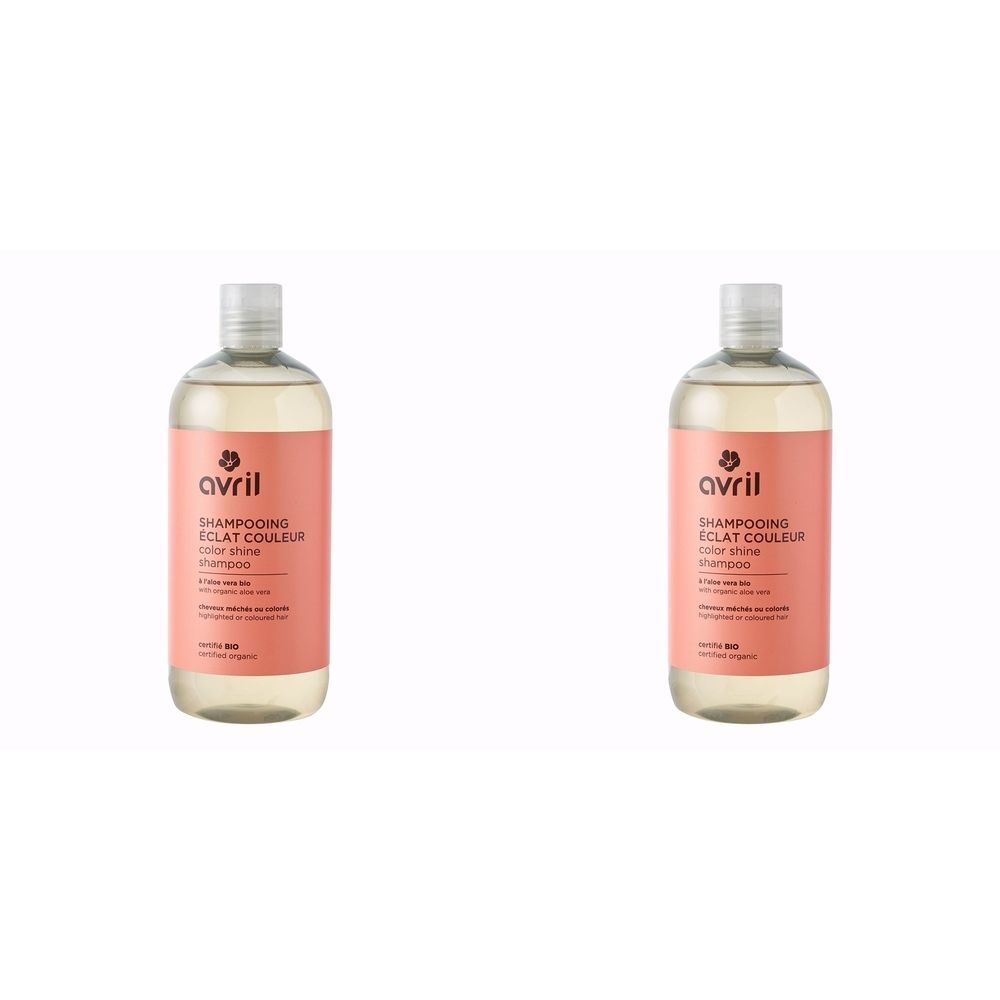 Twee shampoo flessen met roze etiket. Opschrift: Avril, Shampooing Éclat Couleur, Certifié BIO. Transparante vloeistof.