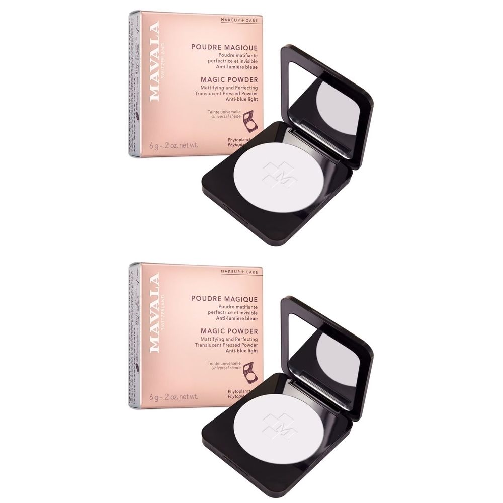 Deux poudres compactes avec miroirs et emballages. Sur les emballages, on lit "MAVALA POUDRE MAGIQUE MAGIC POWDER".