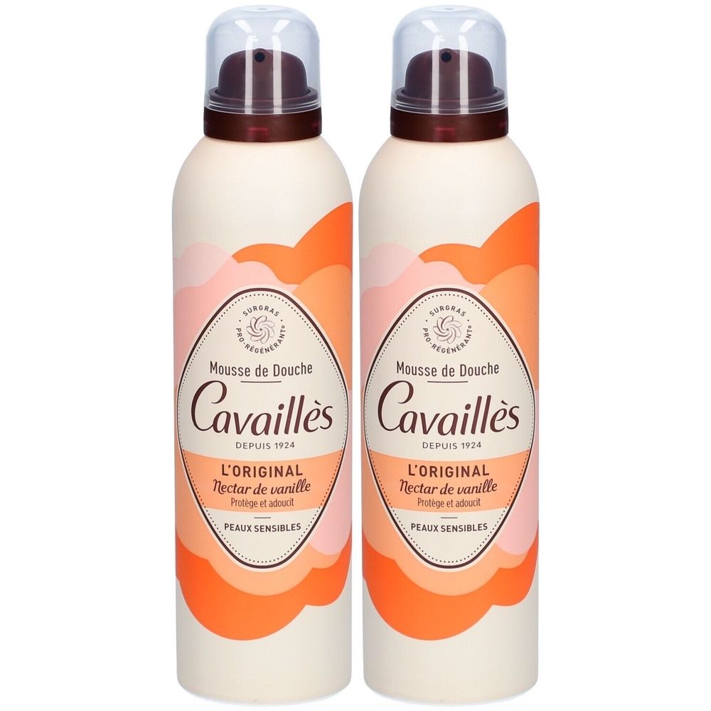 Twee flessen douche mousse. Wit, met oranje en roze elementen. Opschrift: Mousse de Douche, Cavaillès, L'Original Nectar de vanille, Peaux sensibles.