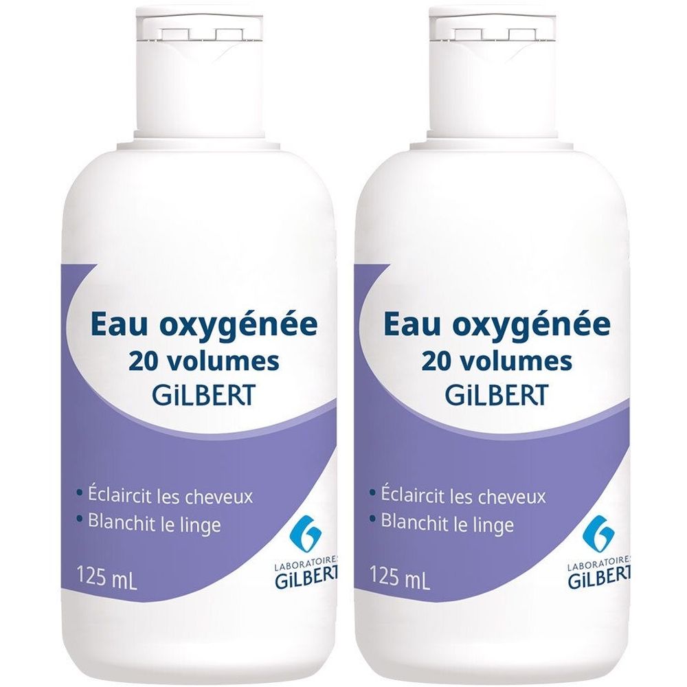 Twee flessen GILBERT Eau oxygénée, 20 volumes. Wit etiket met paarse accenten. Tekst: Eau oxygénée, 125 ml.
