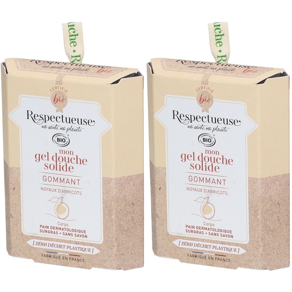 Twee rechthoekige dozen met productinformatie. Opschrift: Respectueuse, gel douche solide, Gommant, Bio-certificering.