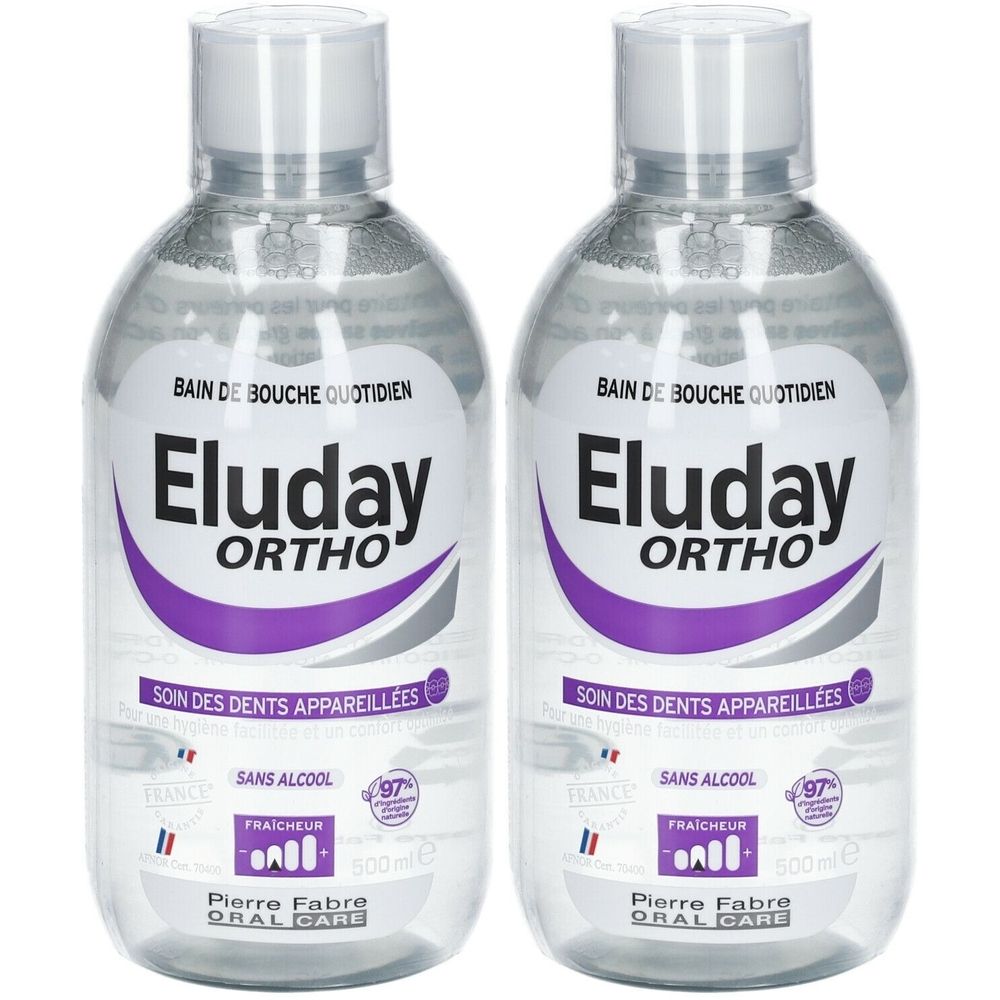 Twee flessen mondspoeling. Opschrift: Eluday Ortho, Bain de bouche quotidien, Soin des dents appareillées. Zonder alcohol.