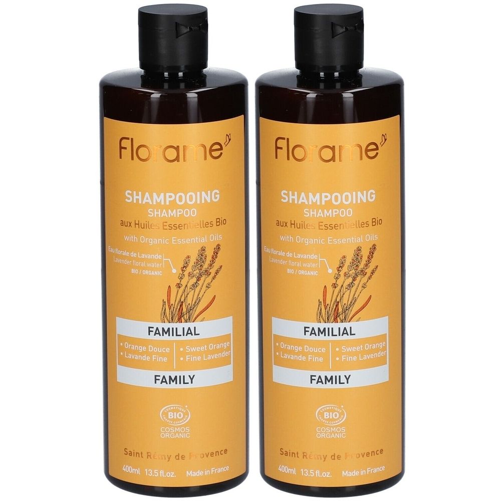 Deux flacons de shampooing bruns. Inscription: Florame, Shampooing, Familial. Avec certification bio. Contient des huiles essentielles. Bouchon noir.