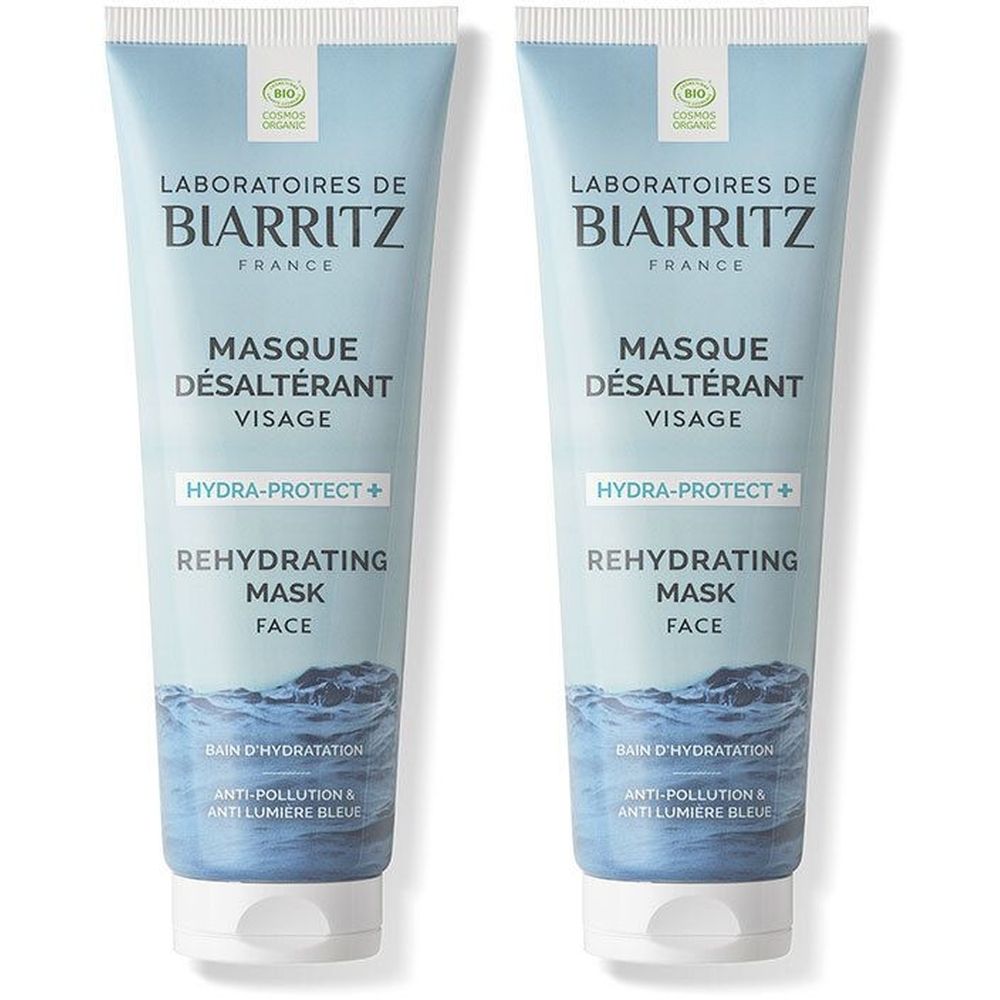 Deux tubes de masque facial bleu clair. Inscriptions: Laboratoires de Biarritz, Masque Désaltérant Visage, Hydra-Protect+ et Rehydrating Mask.