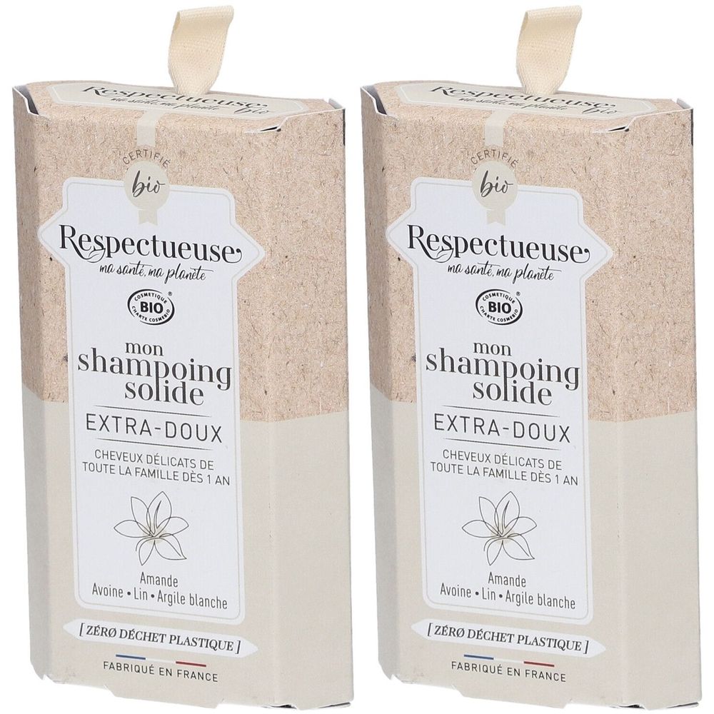 Deux boîtes rectangulaires. Inscription Respectueuse, certification bio, shampoing solide extra-doux. Ruban beige en haut.