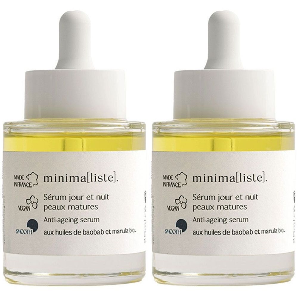 Twee glazen flacons met wit etiket. Opschrift: minima[liste], Sérum jour et nuit peaux matures, Anti-ageing serum. Met pipet.