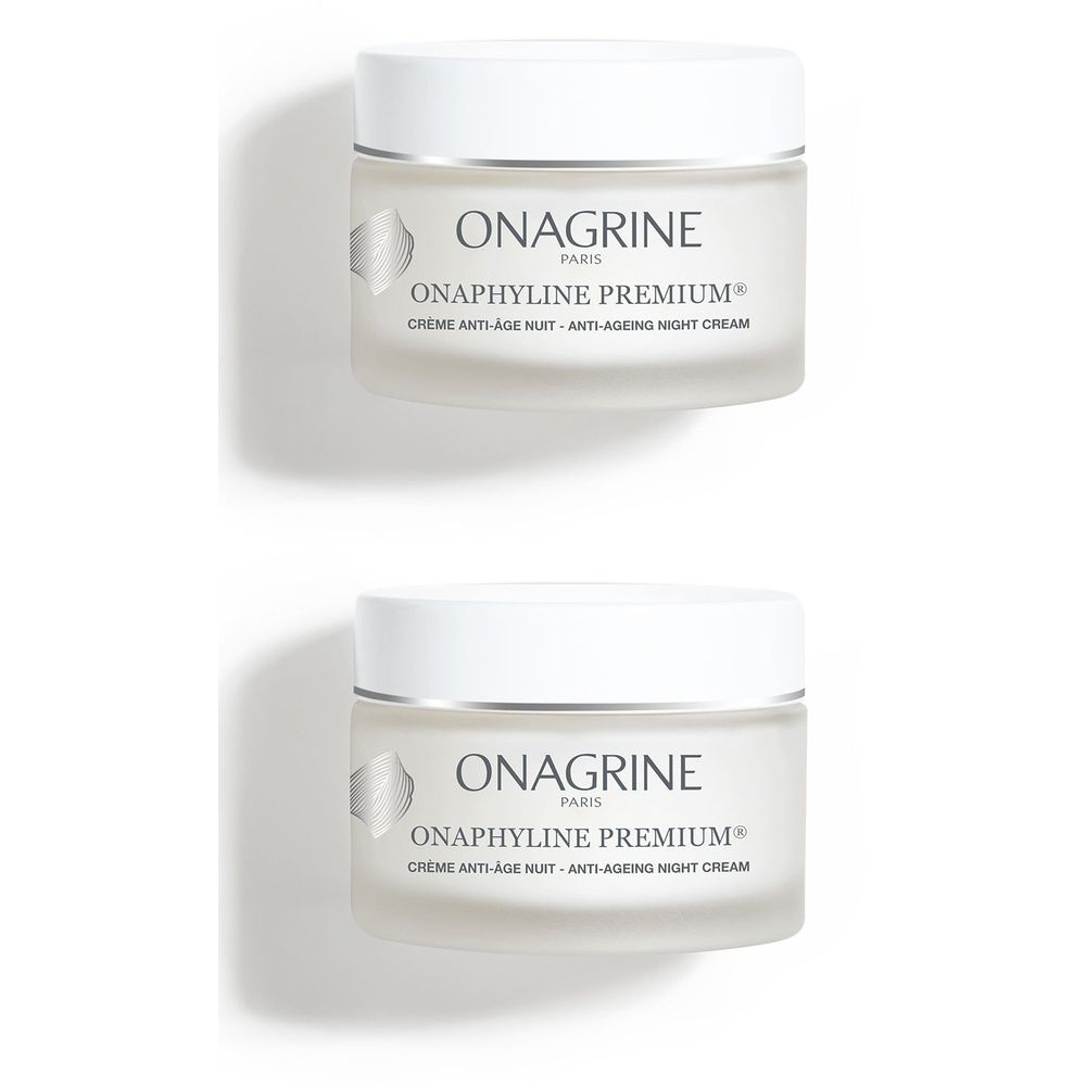 Twee potten Onagrine Onaphyline Premium Crème Anti-Age Nuit. Witte deksels, transparante potten, zilveren rand. Producttekst zichtbaar.