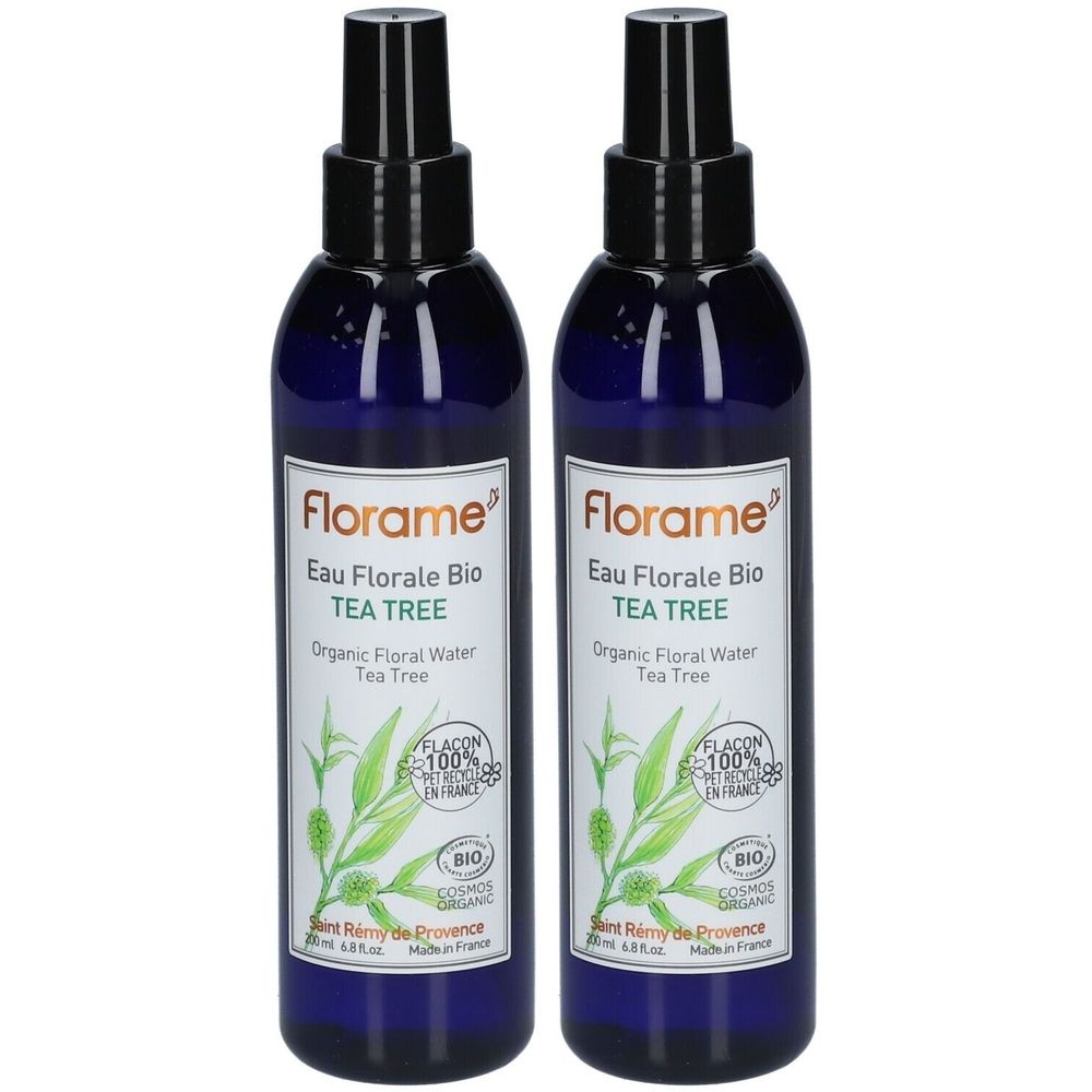 Deux flacons bleus avec vaporisateur noir. Inscription : Florame Eau Florale Bio Tea Tree. Avec label bio.