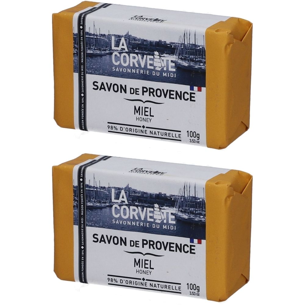 Twee rechthoekige zeepjes in gele verpakking. Op de verpakking staat "LA CORVETTE Savon de Provence Miel".