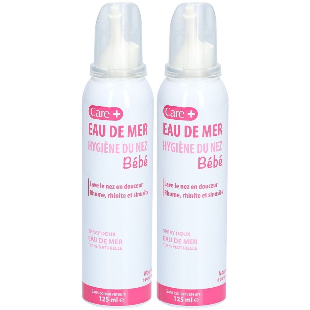 Deux flacons spray blancs avec étiquettes roses. Inscription: CARE+ Eau de mer Hygiène du nez Bébé.