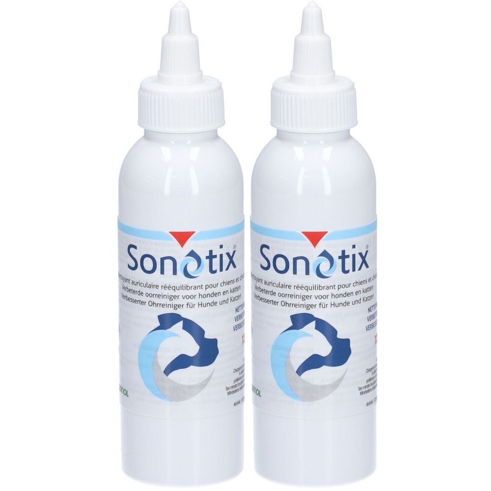 Deux flacons blancs Sonotix. Étiquette avec accents bleus et rouges, silhouette de chien. Nettoyant auriculaire.