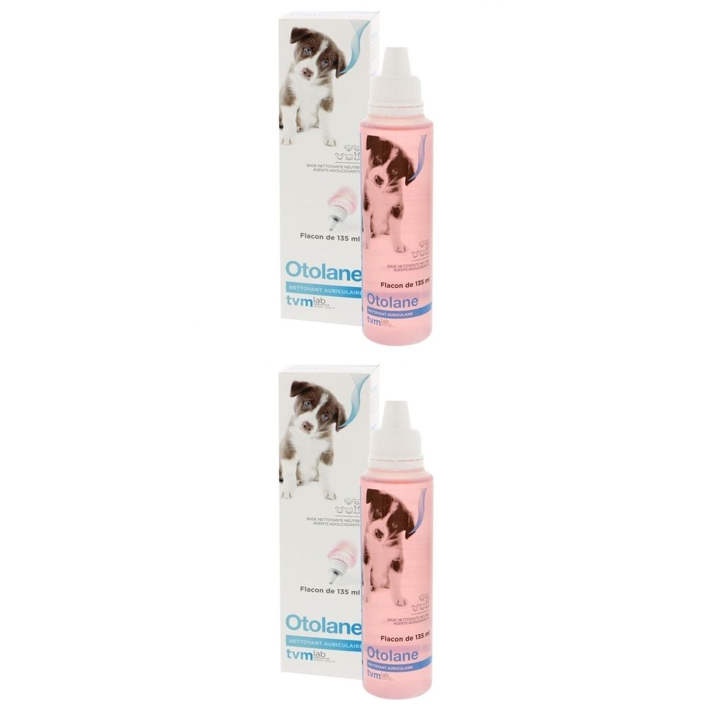 Deux flacons roses avec vaporisateur, à côté de deux boîtes avec des images de chiots. Inscription : Otolane.